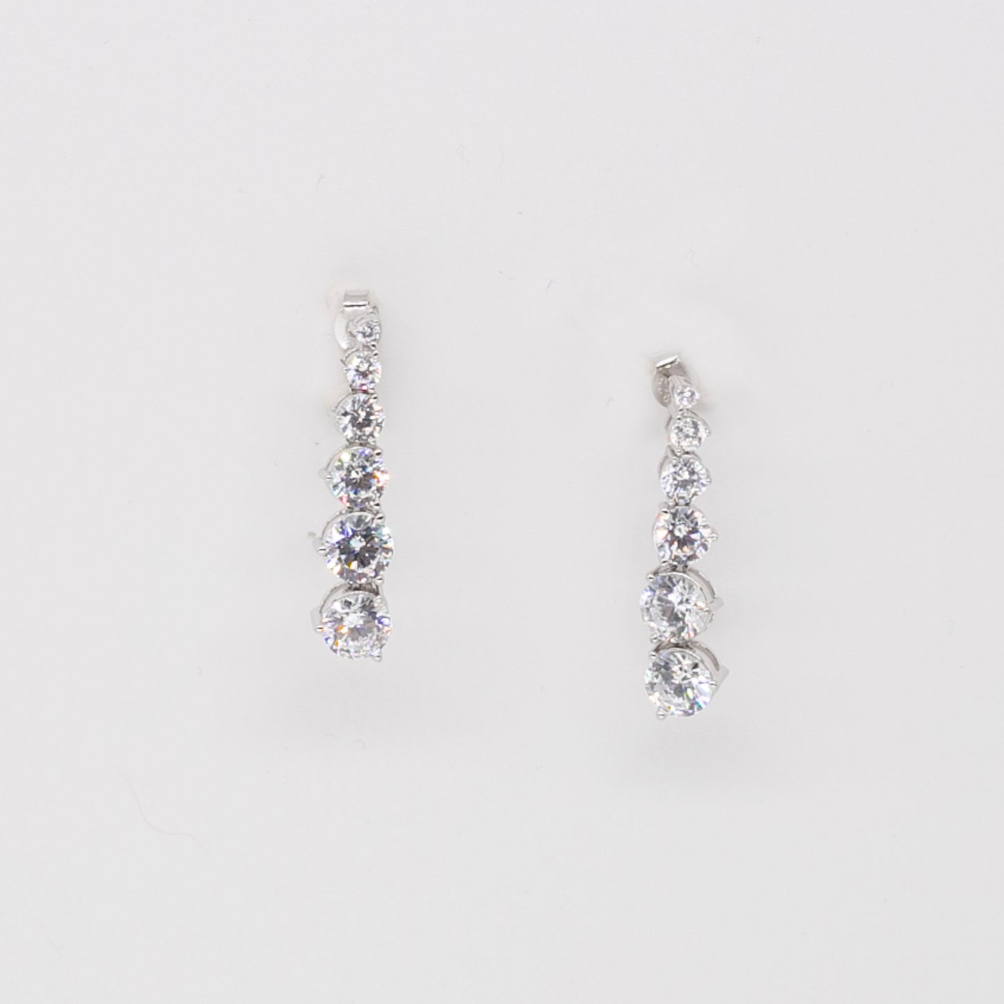 the growing diamond earring